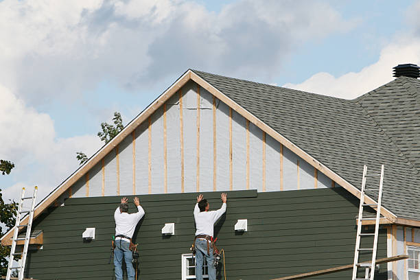 Professional Siding Contractor technician working in East Bend, NC